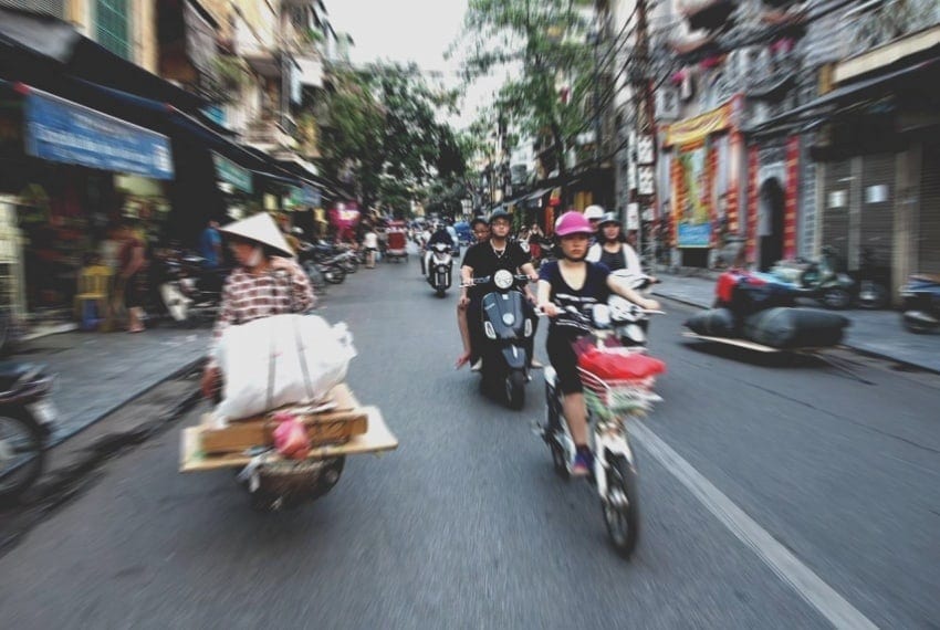 crossing a street in vietnam